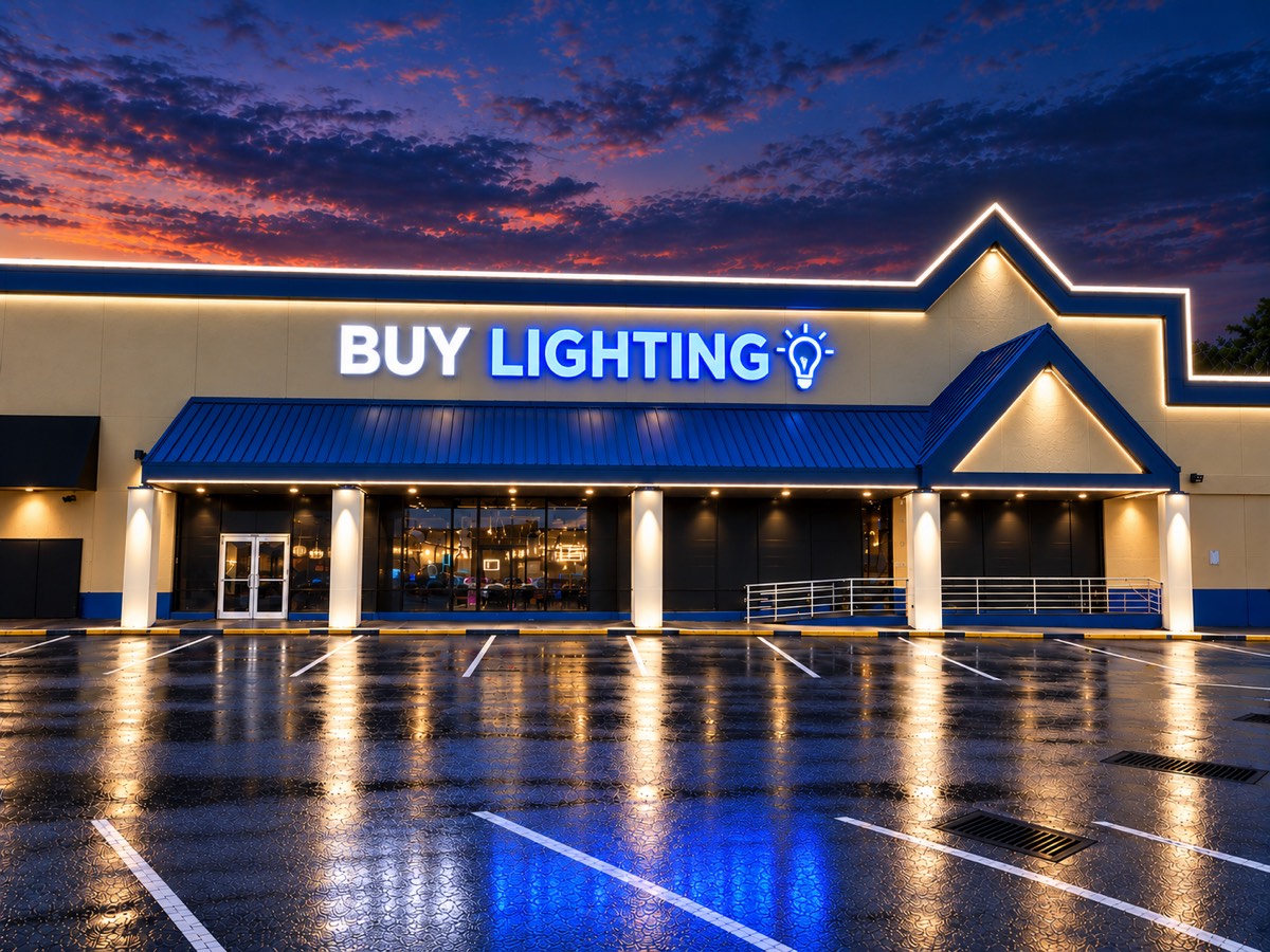 Commercial building with the roofline and canopy outlined in LED at dusk