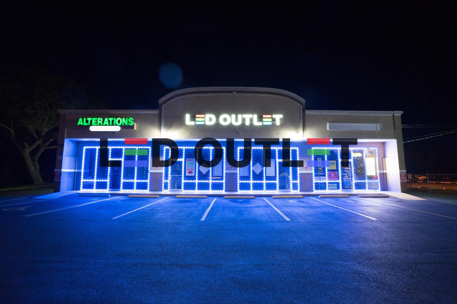 Storefront LED lighting on a commercial building at night, Orlando FL