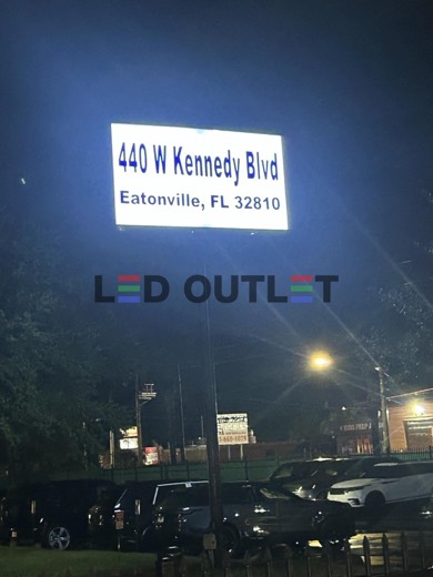 440 W Kennedy Blvd pylon sign lit at night after LED retrofit